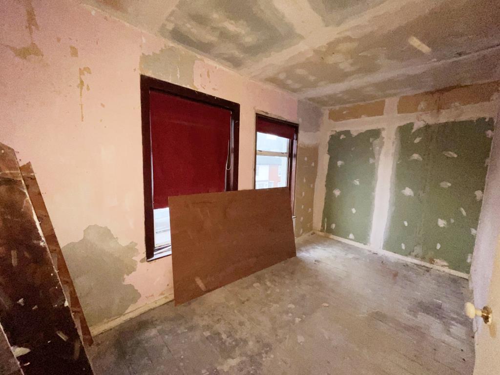 Lot: 75 - FLAT FOR IMPROVEMENT/COMPLETION - Bedroom stripped back with window